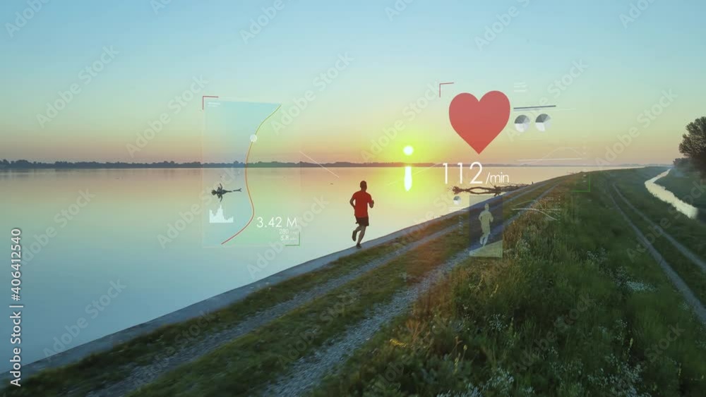 Virtual fitness tracker concept, runner at sunrise using futuristic health app