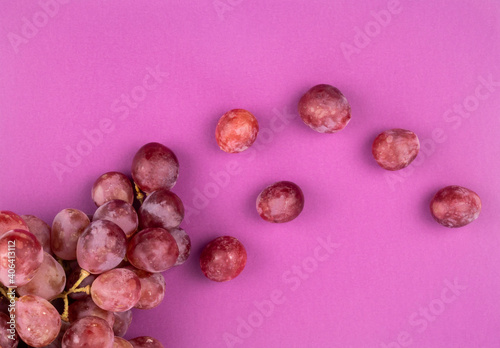 Bunch of grapes Red Globe on pink background