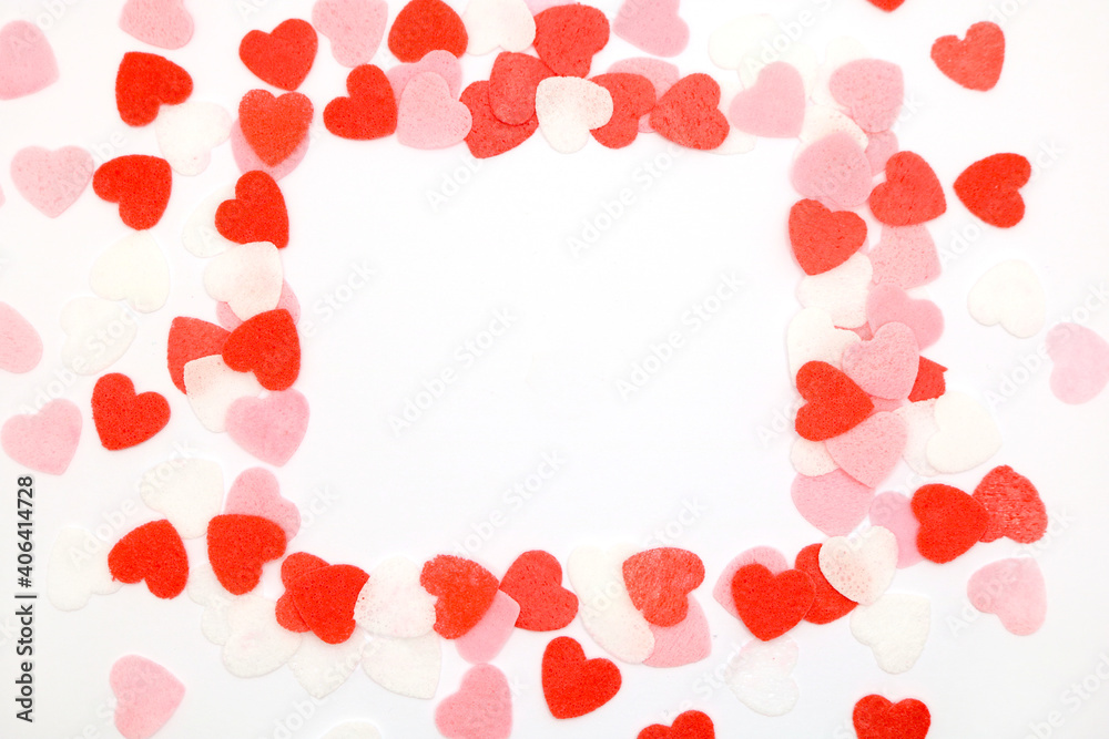 Red pink and white hearts on a white background. Valentine's day concept. Selective focus. Postcard. Background. Red pink and white hearts on a white background. Valentine's day concept. Selective focus. Postcard. Background.