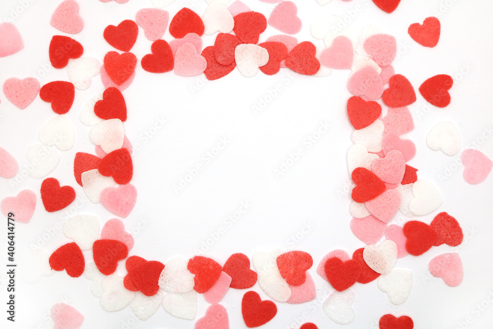 Red pink and white hearts on a white background. Valentine's day concept. Selective focus. Postcard. Background.