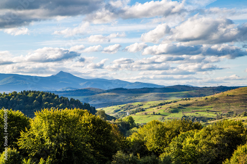 beautiful background on the tops of mountains and trees. Summer season