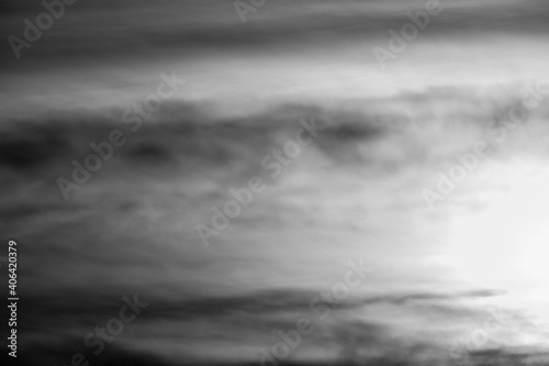 Monochrome cloud image forming abstract pattern with negative space
