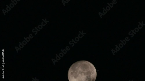 Moon passing thourgh the sky
 photo