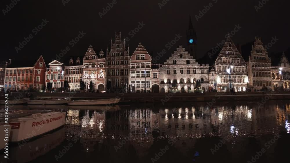 Medieval Merchant Houses At Graslei On The Bank Of Leie River In Historic City Center Of Ghent, Belgium At Night. - wide static Medieval Merchant Houses At Graslei On The Bank Of Leie River In Historic City Center Of Ghent, Belgium At Night. - wide static