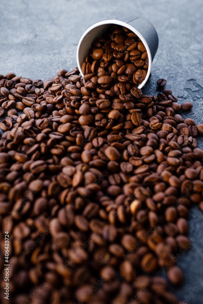 Fototapeta premium Coffee beans in a paper cup.