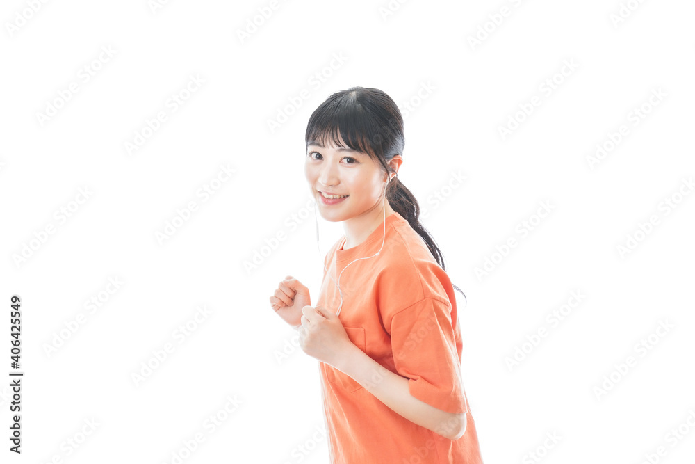 ランニングをする若い女性 ランニングをする若い女性