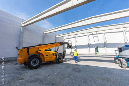 Warehouse construction site. Building a new industrial hall photo