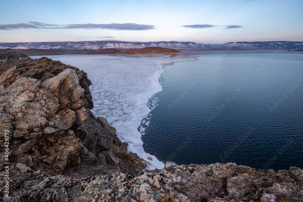 Border of frozen ice and water on Lake Baikal Border of frozen ice and water on Lake Baikal