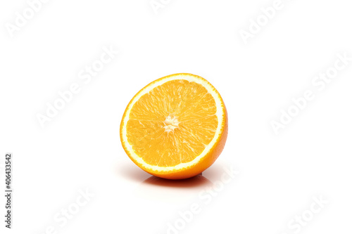 Half sliced delicious and juicy ripe oranges isolated