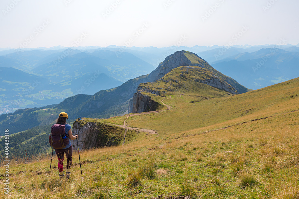young woman at the mountain ridge trail, Rofan mountains austria