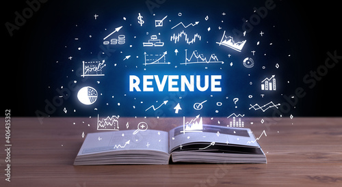 REVENUE inscription coming out from an open book, business concept