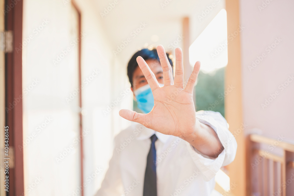 Asian Man surgical mask inspection or man business with covid 19 for stop covid 19 virus covid-19 or corona protected Help protect For social distancing world and people stop virus warning