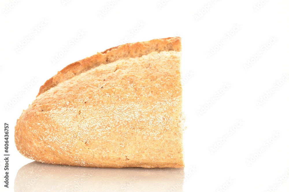One half of a fragrant loaf without yeast with bran flakes, close-up, isolated on white.