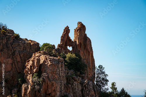 Heart shaped hole in a rock formation in the bizzare landscape of Calanche de Piana, located in n the Gulf of Porto, on the west coast of Corsica, France photo