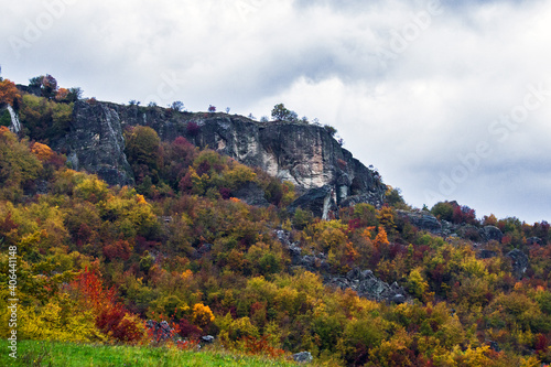 Autumn forest and Bismantova climbing rock, Reggio Emila Italy photo