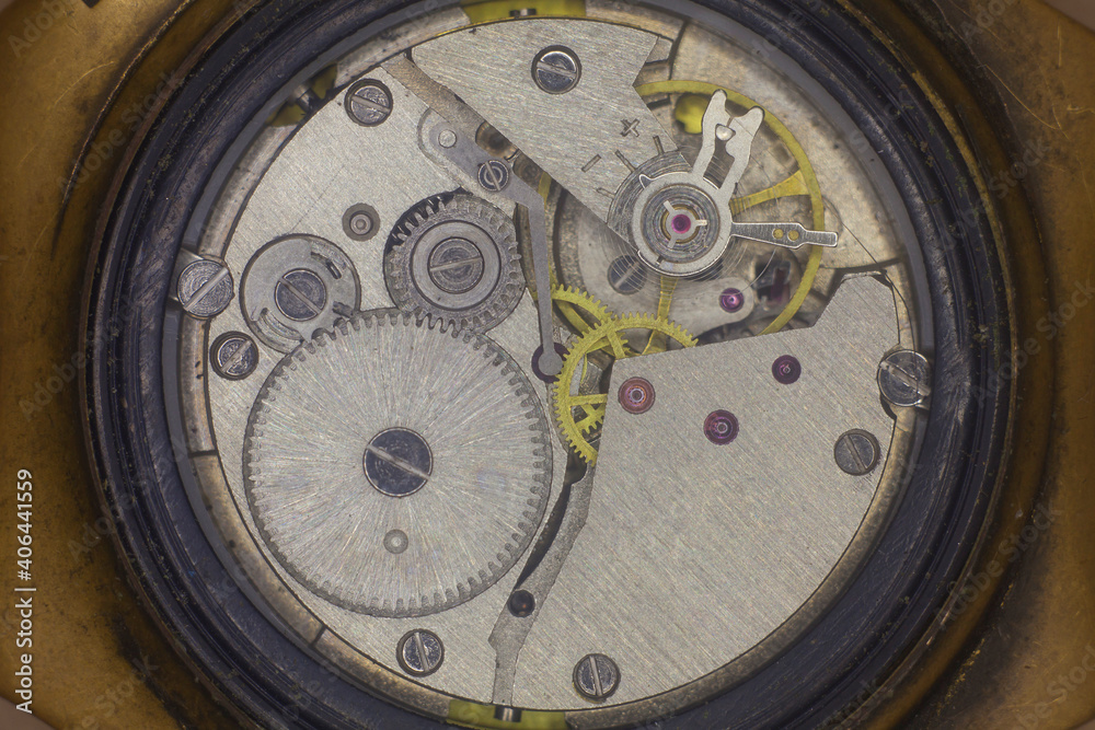 Old and worn watch movement close up