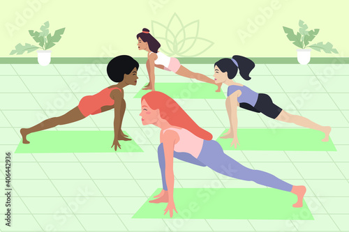 Girls do yoga in a group