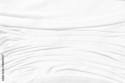 Top view Abstract White cloth background with soft waves.Wave and curve overlapping with different shadow of color,white fabric, crumpled fabric.