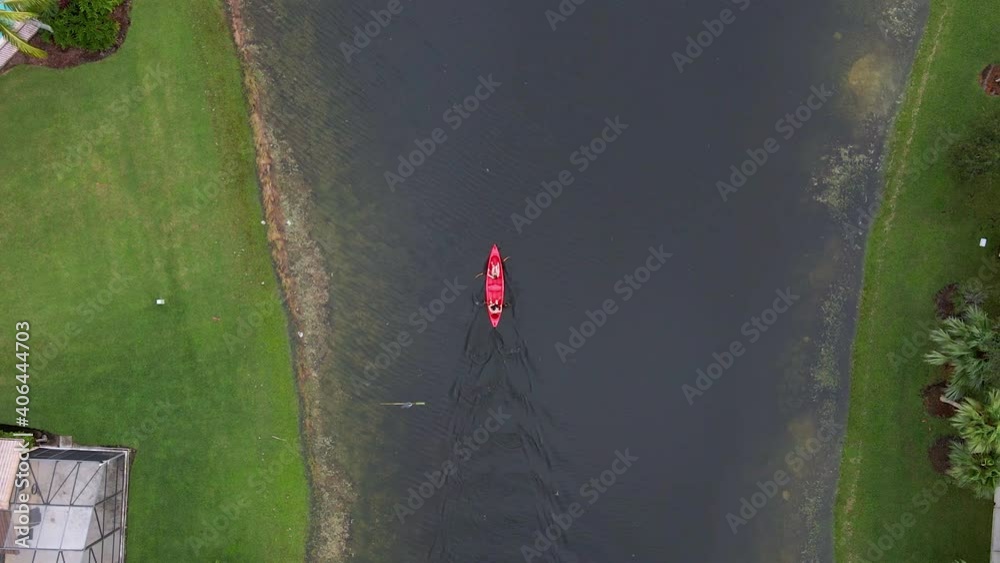 Aerial view above people kayaking in Weston, overcast day, in Miami, Florida, USA - overhead, drone shot Aerial view above people kayaking in Weston, overcast day, in Miami, Florida, USA - overhead, drone shot