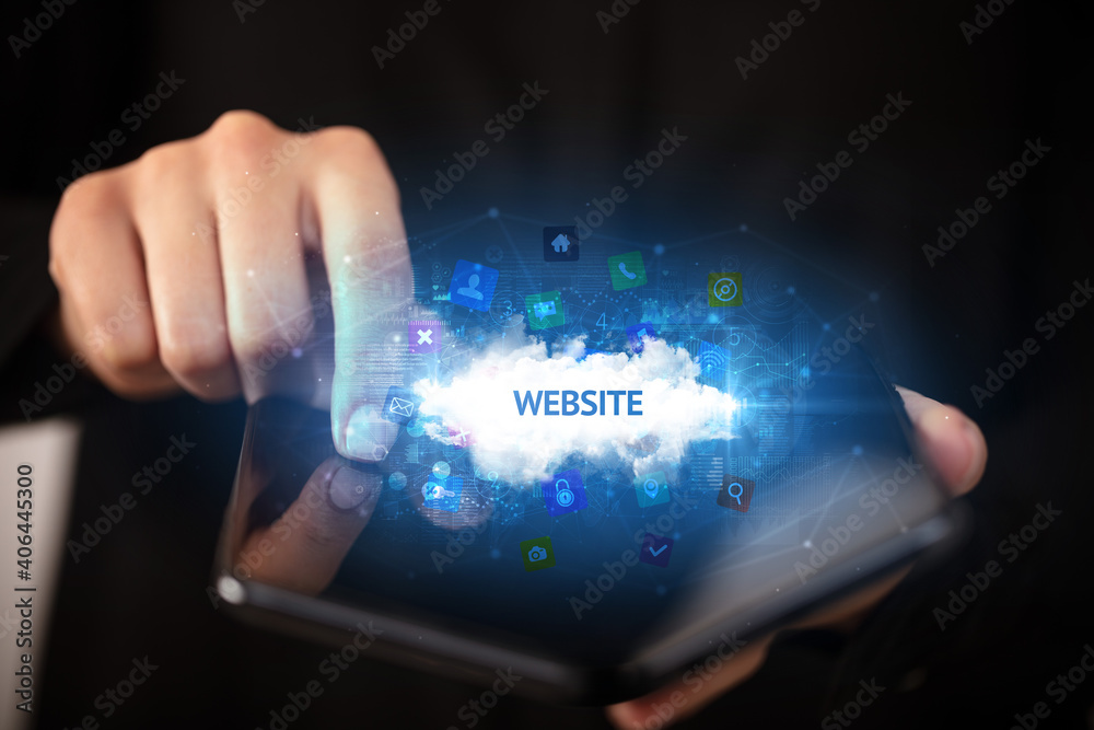 Businessman holding a foldable smartphone with WEBSITE inscription, technology concept Businessman holding a foldable smartphone with WEBSITE inscription, technology concept