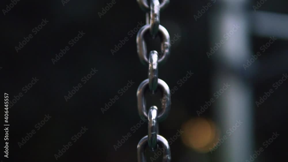 Galvanized Link Chain In Black Background. - close up Galvanized Link Chain In Black Background. - close up