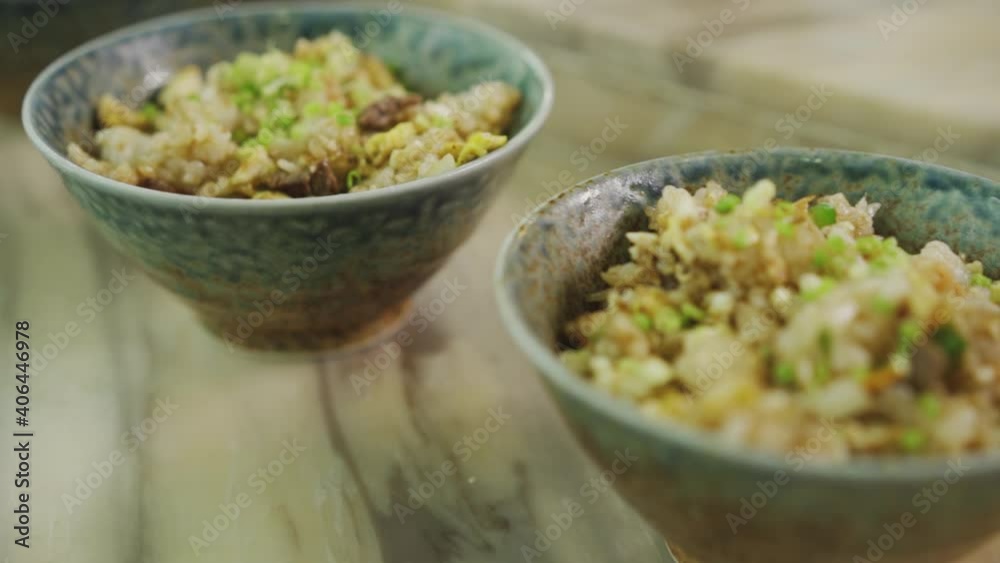 Fried Rice With Scrambled Egg, Spring Onions And Ground Pork Meat Put In A Serving Bowl - Close Up Shot Fried Rice With Scrambled Egg, Spring Onions And Ground Pork Meat Put In A Serving Bowl - Close Up Shot