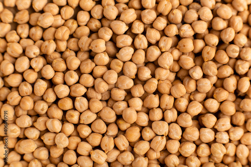 Raw dry chickpeas background close-up top view