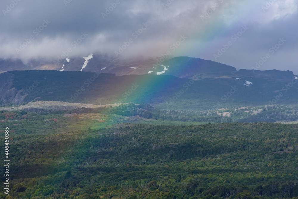 Rainbow view over the Andes mountain in Los Alerces National Park, Patagonia, Argentina