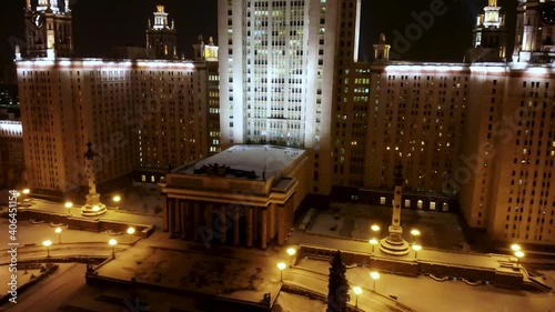 Aerial shot of Moscow State University at night in winter of Entrance