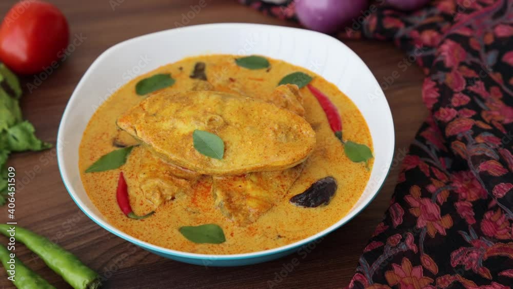 Kerala fish curry coconut milk gravy , cooking spicy Goan fish curry , Indian fish curry Bengali fish curry in coconut milk 4K slow motion video footage Kolkata, India Sri Lanka. Lankan food. Kerala fish curry coconut milk gravy , cooking spicy Goan fish curry , Indian fish curry Bengali fish curry in coconut milk 4K slow motion video footage Kolkata, India Sri Lanka. Lankan food.