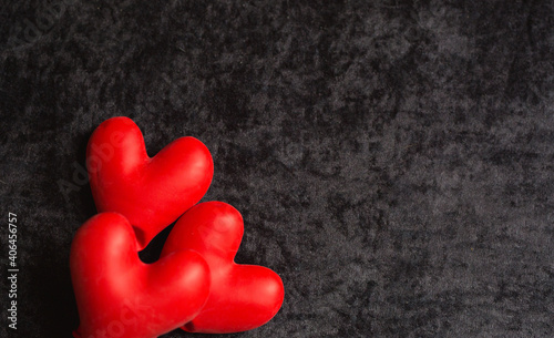 happy valentines day. red balloons in the form of a heart on a black background. copy space for text.