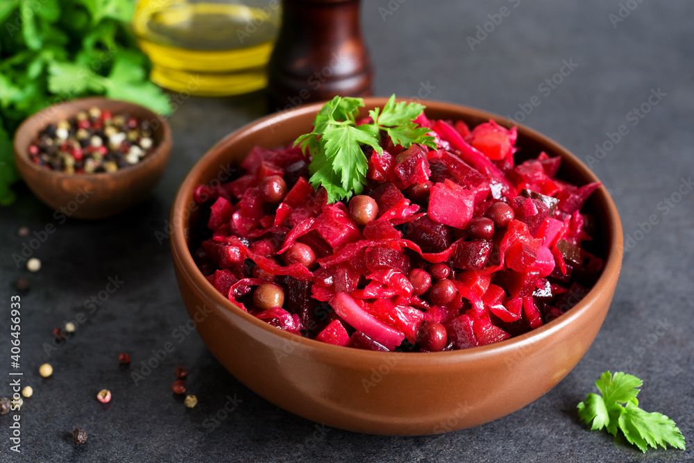 Traditional Russian salad with beets. The vinaigrette. Root vegetable salad. Traditional Russian salad with beets. The vinaigrette. Root vegetable salad.