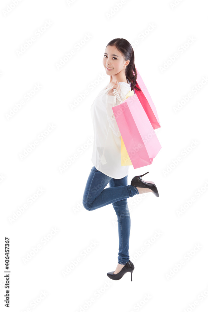 Portrait of a Young woman carrying shopping bags Portrait of a Young woman carrying shopping bags