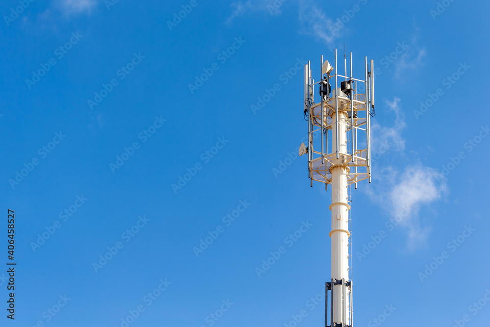 Telecommunication tower, 4G and 5G radio network telecommunication equipment with radio modules and smart antennas mounted on a metal Telecommunication tower, 4G and 5G radio network telecommunication equipment with radio modules and smart antennas mounted on a metal