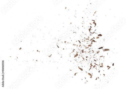 Wood pieces and dust, crushed bark isolated on white background, organic texture, top view