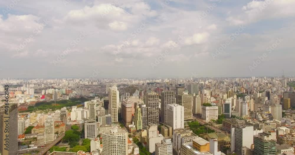Aerial view of a many apartment buildings and streets, sunny day, in the city of Sao Paulo, Brazil - reverse, drone shot Aerial view of a many apartment buildings and streets, sunny day, in the city of Sao Paulo, Brazil - reverse, drone shot