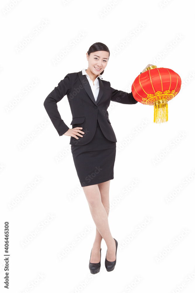 A young Business womman holding red lantern A young Business womman holding red lantern