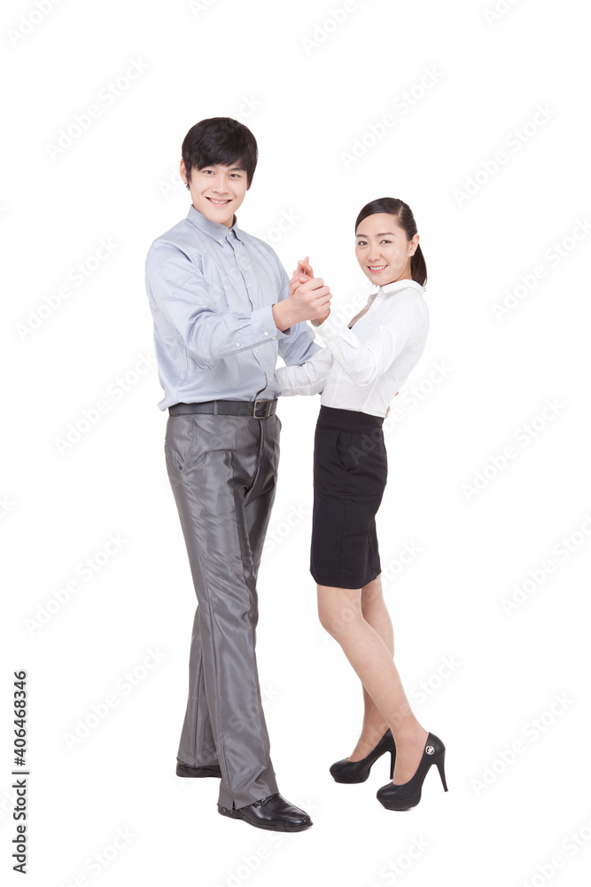Portrait of business man and business woman dancing Portrait of business man and business woman dancing