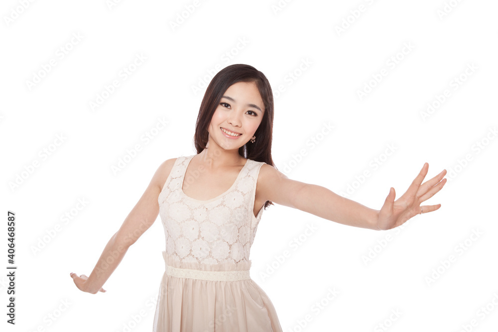 A Young woman standing with arms outstretched A Young woman standing with arms outstretched