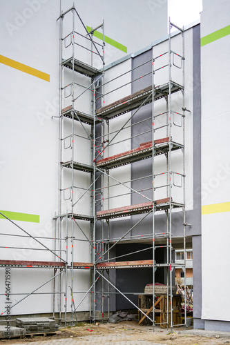 renovation of the facade of an apartment house using scaffolding