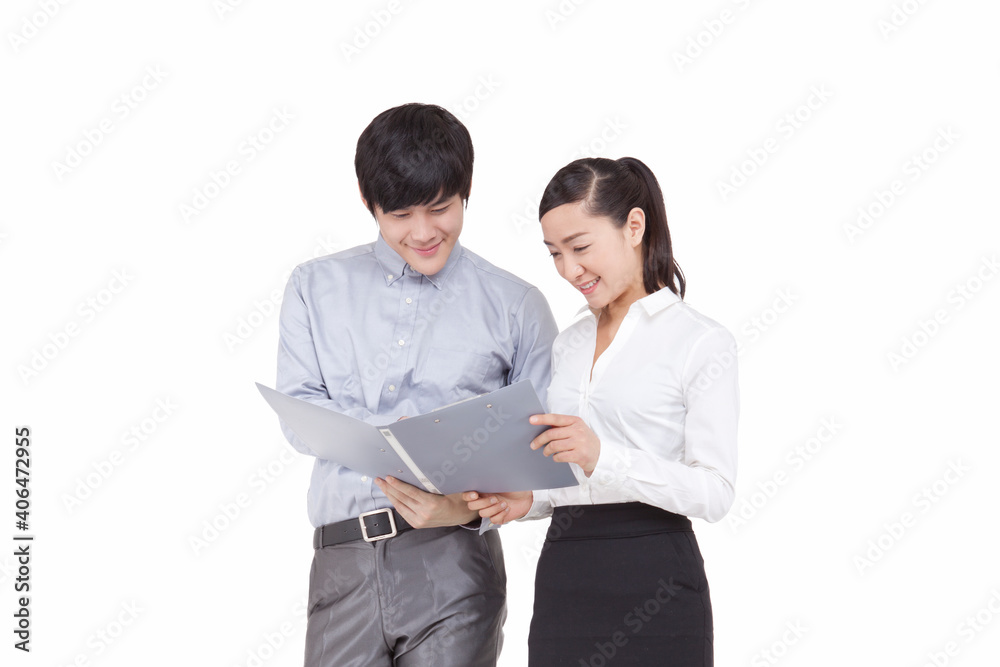 Portrait of businessman and businesswoman looking at folders Portrait of businessman and businesswoman looking at folders
