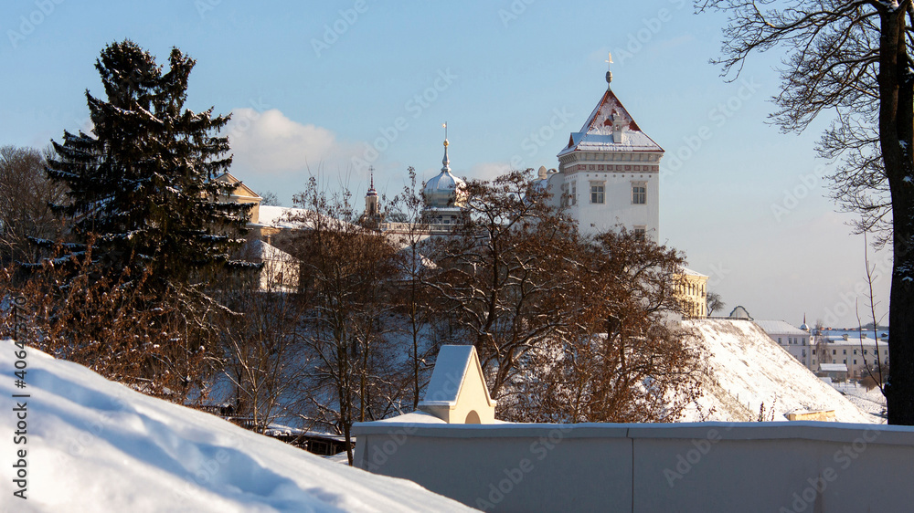 Sights and views of Grodno. Belarus. View of the restored building of the Old Castle on a high snow-covered hill.