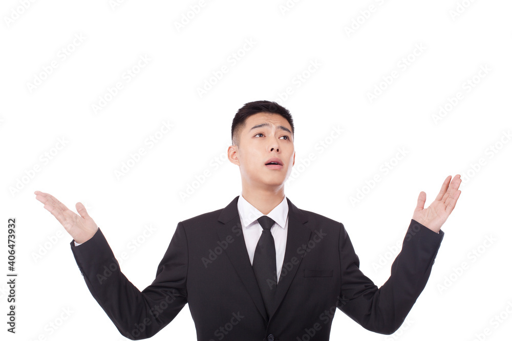 Portrait of young bisinessman looking up disappointedly Portrait of young bisinessman looking up disappointedly
