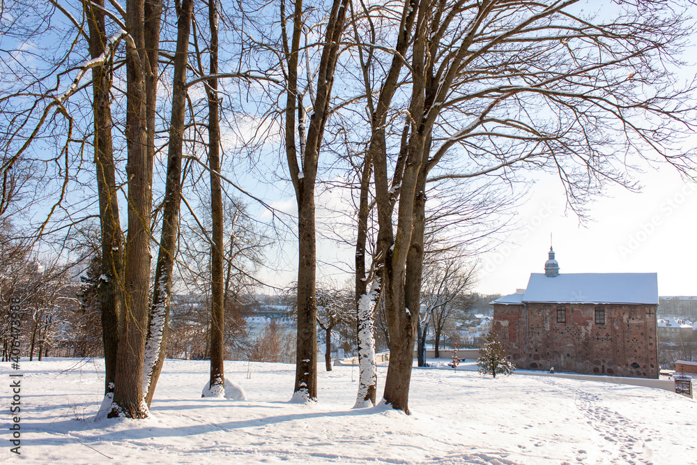 Grodno. Belarus. An old 12th century Orthodox church in a winter park. Grodno. Belarus. An old 12th century Orthodox church in a winter park.