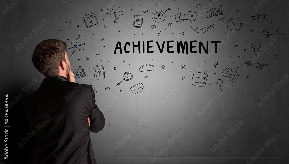 businessman drawing a creative idea sketch with ACHIEVEMENT inscription, business strategy concept businessman drawing a creative idea sketch with ACHIEVEMENT inscription, business strategy concept