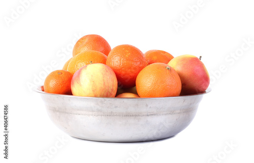 Metal plate with ripe fruits. Isolated object on white background