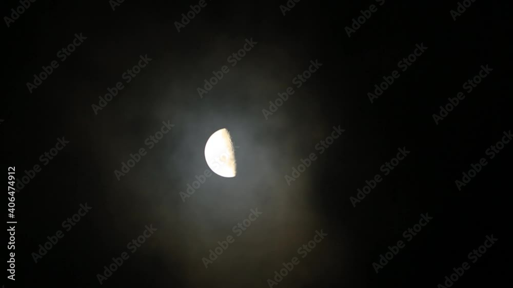Moon passing by over the sky in the night Moon passing by over the sky in the night