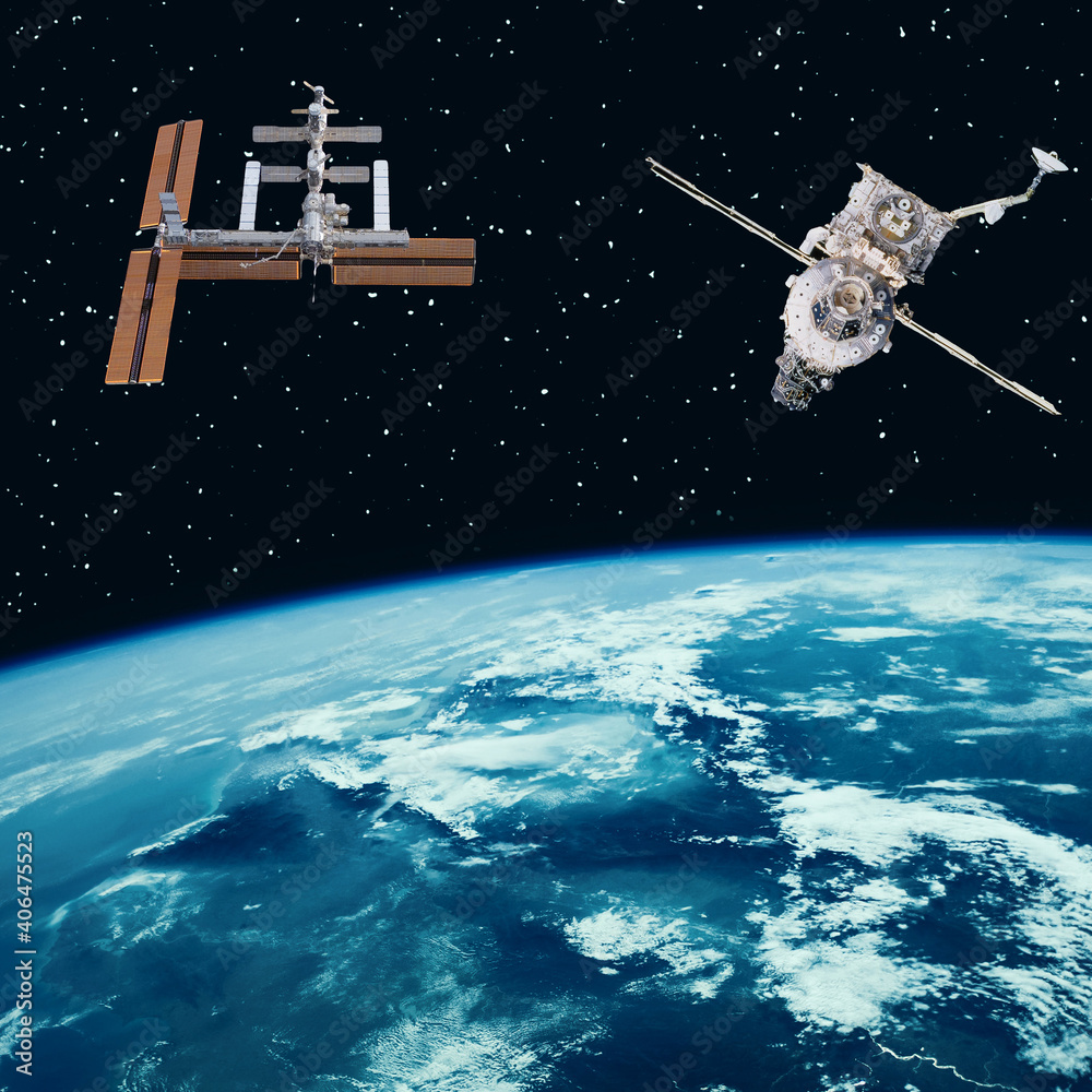 Satellites above the earth. The elements of this image furnished by NASA. Satellites above the earth. The elements of this image furnished by NASA.