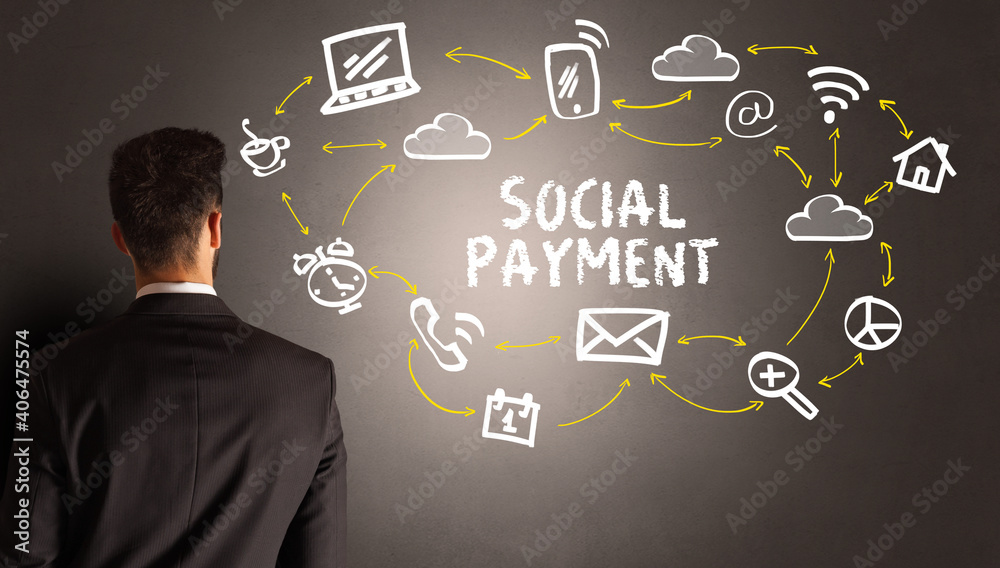 businessman drawing social media icons with SOCIAL PAYMENT inscription, new media concept businessman drawing social media icons with SOCIAL PAYMENT inscription, new media concept