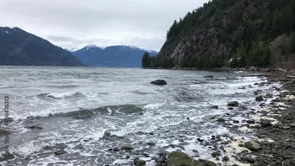 Porteau Cove Marina Park's mountains and coastline, panning long shot Porteau Cove Marina Park's mountains and coastline, panning long shot